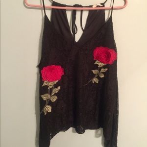 Long sleeved open shoulder top